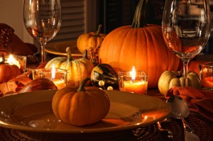 Festive autumn place settings with pumpkins