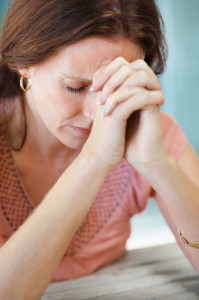 mature-woman-praying-to-god-with-hope-xs