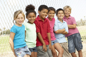 Group Of Children Playing In Park