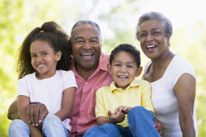 Grandparents laughing with grandchildren